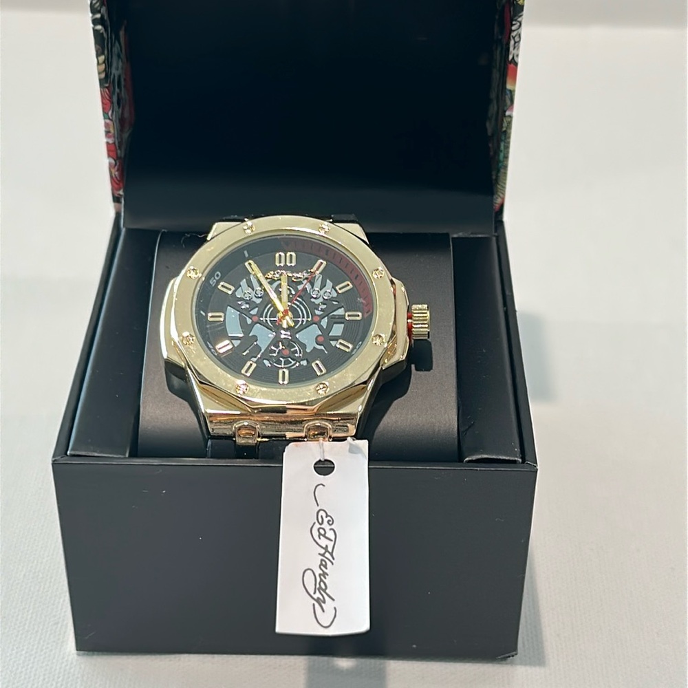 New in Box Ed Hardy Men’s Goldtone Face Watch W/ Hour, Minute and Second hands.